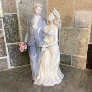 Wedding couple porcelain figurine. Approx. 9" tall 5" wide